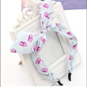 Light Blue Kiss Headband  ( Any 5 Items For $20 )